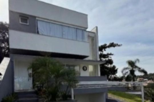Fachada de casa de condomínio à venda com 3 quartos, 50m² em Hípica, Porto Alegre