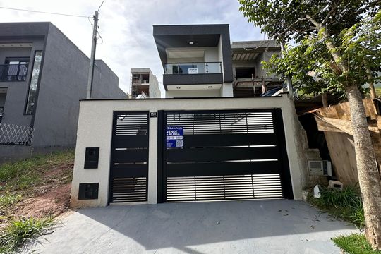 Fachada de casa de condomínio à venda com 3 quartos, 178m² em Villas do Jaguari, Santana de Parnaíba