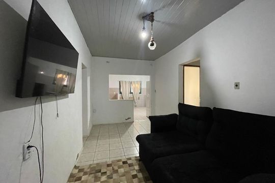 Sala de casa à venda com 4 quartos, 80m² em Vila Nova, Novo Hamburgo