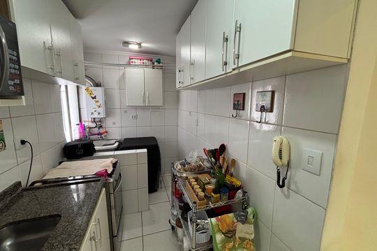 Cozinha de apartamento à venda com 2 quartos, 50m² em Vila Pierina, São Paulo