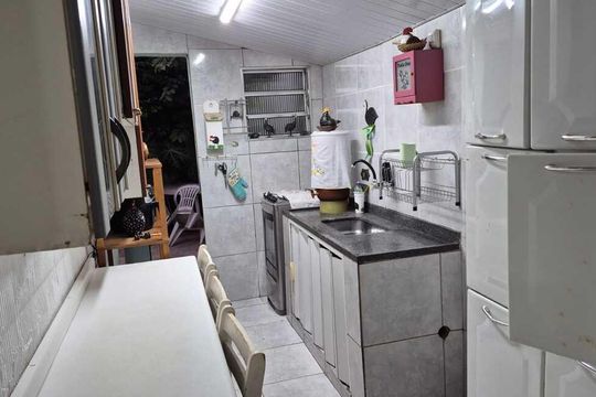 Cozinha de casa para alugar com 2 quartos, 70m² em Jardim Oriental, São Paulo