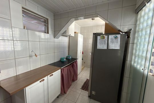 Cozinha e lavanderia de apartamento para alugar com 3 quartos, 75m² em Taguatinga, Brasília