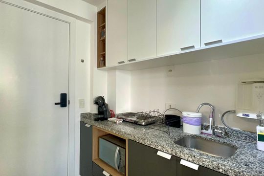 Cozinha de kitnet/studio à venda com 1 quarto, 21m² em Jardim Paulista, São Paulo
