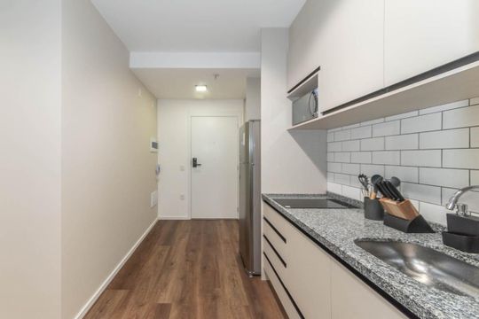 Cozinha de apartamento para alugar com 1 quarto, 27m² em Brooklin, São Paulo
