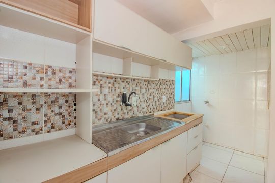 Cozinha e Área de Serviço de apartamento à venda com 2 quartos, 48m² em Sarandi, Porto Alegre