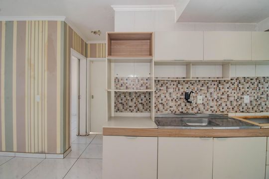 Cozinha e Área de Serviço de apartamento à venda com 2 quartos, 48m² em Sarandi, Porto Alegre