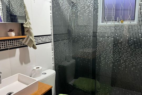Banheiro de casa à venda com 3 quartos, 148m² em Rio Branco, Canoas