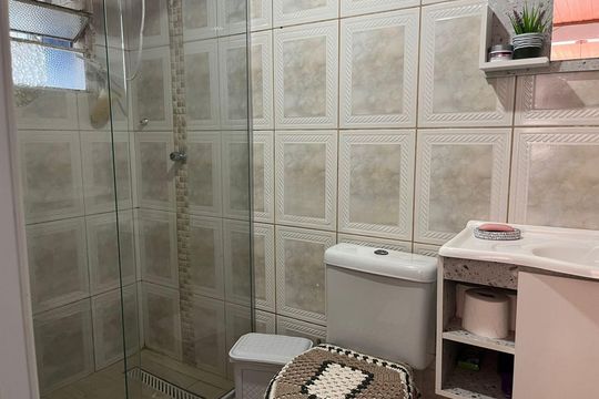 Banheiro de casa à venda com 3 quartos, 148m² em Rio Branco, Canoas