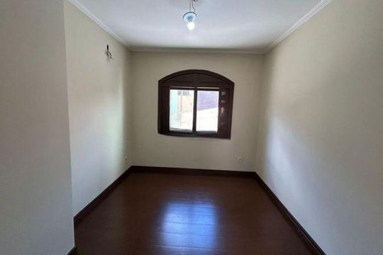 Quarto 1 de casa de condomínio para alugar com 3 quartos, 80m² em Jardim Itu, Porto Alegre