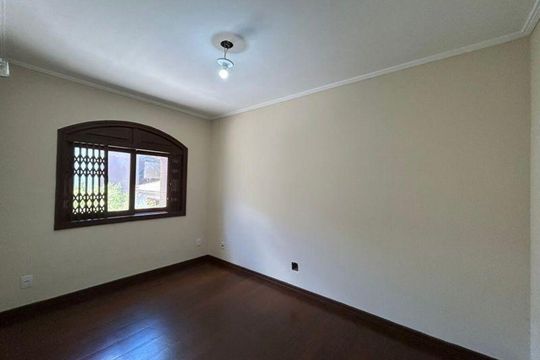 Quarto 2 de casa de condomínio para alugar com 3 quartos, 80m² em Jardim Itu, Porto Alegre