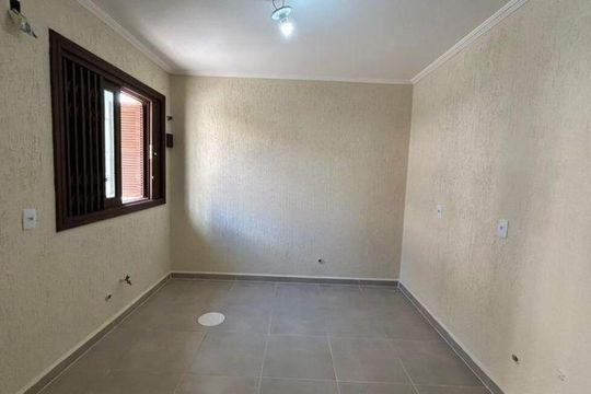 Quarto 3 de casa de condomínio para alugar com 3 quartos, 80m² em Jardim Itu, Porto Alegre