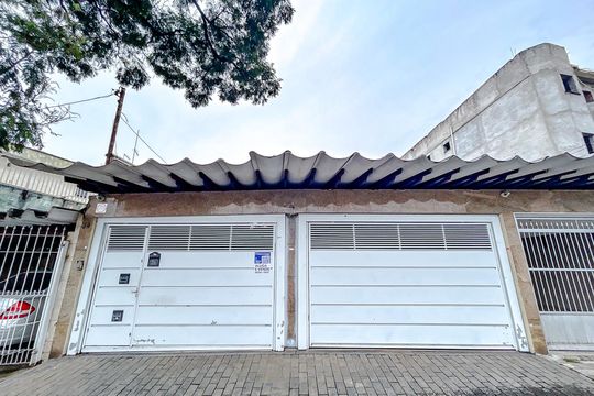 Fachada com Plaquinha de casa à venda com 4 quartos, 456m² em Vila Carrão, São Paulo