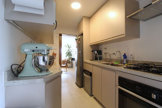 Cozinha e Área de Serviço de apartamento à venda com 2 quartos, 60m² em Vila Olímpia, São Paulo