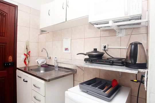 Cozinha de kitnet/studio à venda com 1 quarto, 20m² em Centro Histórico, Porto Alegre