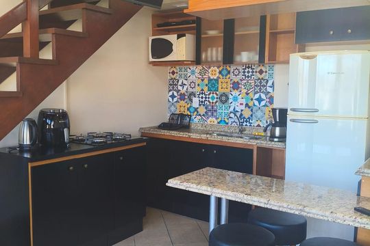 Cozinha de apartamento à venda com 1 quarto, 40m² em Jardim Botânico, Porto Alegre