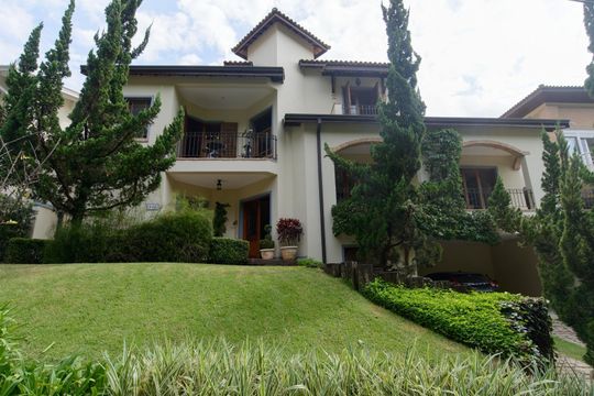 Fachada de casa de condomínio à venda com 4 quartos, 416m² em Residencial Quatro (Alphaville), Santana de Parnaíba