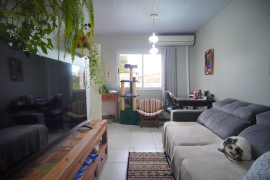 Sala de casa de condomínio à venda com 3 quartos, 55m² em Feitoria, São Leopoldo