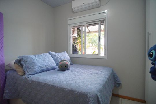 Quarto 1 de casa de condomínio à venda com 3 quartos, 55m² em Feitoria, São Leopoldo
