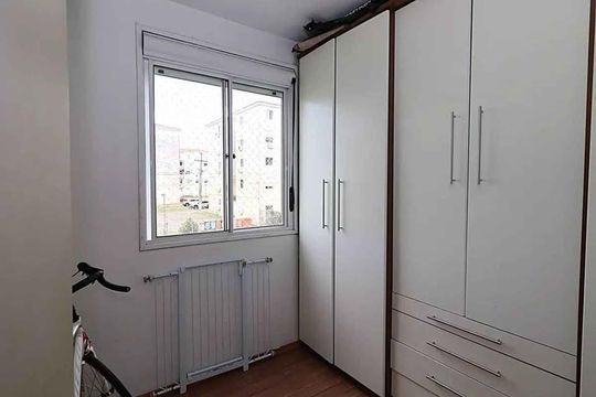 Quarto 1 de apartamento para alugar com 3 quartos, 55m² em Humaitá, Porto Alegre