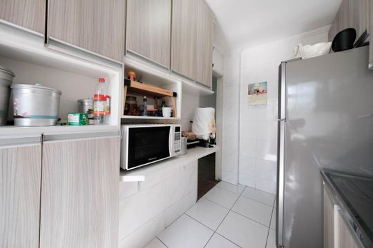 Cozinha e Área de Serviço de apartamento à venda com 2 quartos, 60m² em Parque Paineiras, São Paulo