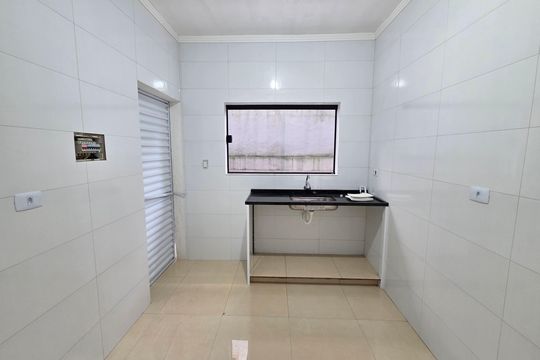 Cozinha de casa de condomínio para alugar com 2 quartos, 70m² em Anhanguera, Praia Grande