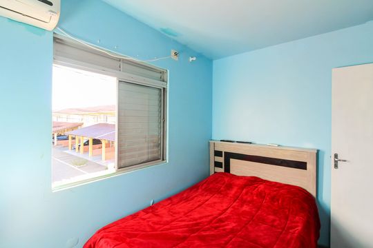 Quarto 2 de casa de condomínio à venda com 2 quartos, 60m² em Rio Branco, Canoas