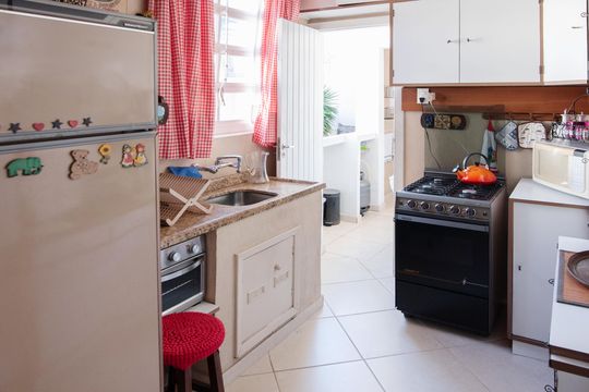 Cozinha de casa para alugar com 2 quartos, 110m² em Higienópolis, Porto Alegre
