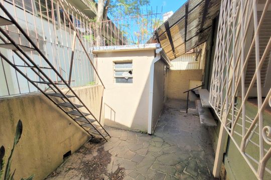 Área externa de casa à venda com 3 quartos, 130m² em Jardim Botânico, Porto Alegre