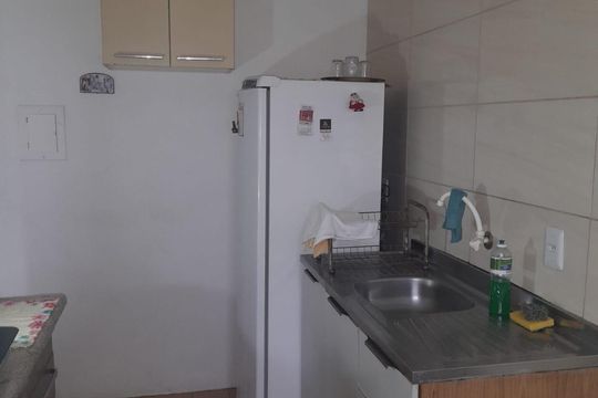 Cozinha de apartamento à venda com 2 quartos, 54m² em Santo Antônio, Porto Alegre