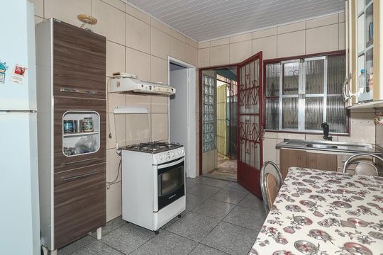 Cozinha de casa à venda com 3 quartos, 126m² em Mário Quintana, Porto Alegre