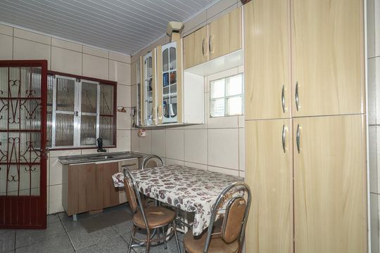 Cozinha de casa à venda com 3 quartos, 126m² em Mário Quintana, Porto Alegre