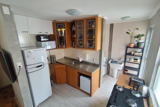 Cozinha de apartamento à venda com 2 quartos, 77m² em Petrópolis, Porto Alegre