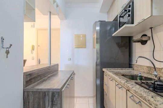 Cozinha de apartamento à venda com 1 quarto, 50m² em São Geraldo, Porto Alegre