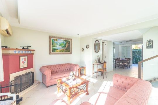 Sala de casa de condomínio para alugar com 3 quartos, 223m² em Santa Tereza, Porto Alegre