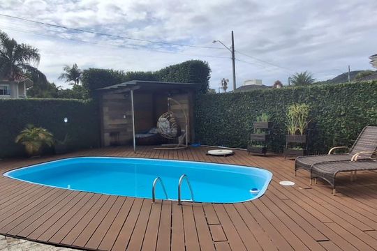 Área externa de casa para alugar com 4 quartos, 204m² em Jurerê, Florianópolis