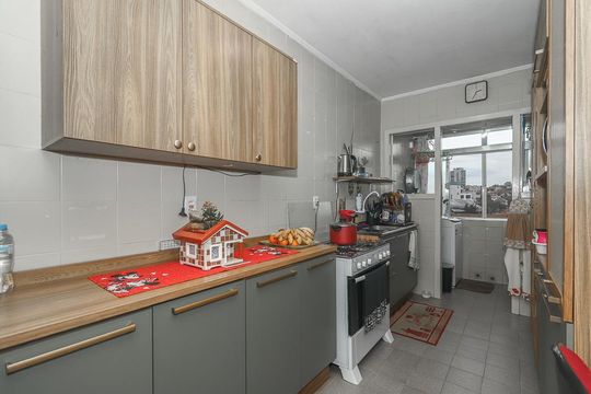 Cozinha de apartamento à venda com 3 quartos, 102m² em Jardim Itu, Porto Alegre