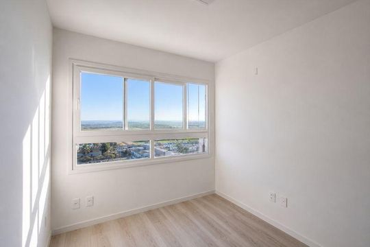 Quarto 1 de apartamento para alugar com 3 quartos, 66m² em Jardim Lindóia, Porto Alegre
