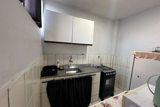Cozinha de apartamento para alugar com 1 quarto, 50m² em Morro dos Barbosas, São Vicente