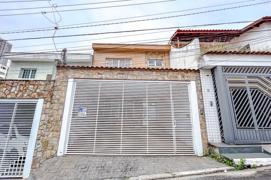 Fachada com Plaquinha de casa para alugar com 3 quartos, 150m² em Vila Gomes Cardim, São Paulo