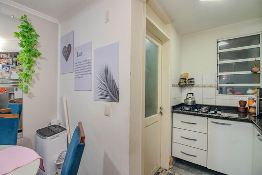 Cozinha de casa de condomínio à venda com 3 quartos, 86m² em Jardim Itu, Porto Alegre
