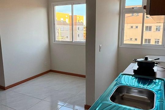 Cozinha de apartamento à venda com 1 quarto, 30m² em Hípica, Porto Alegre