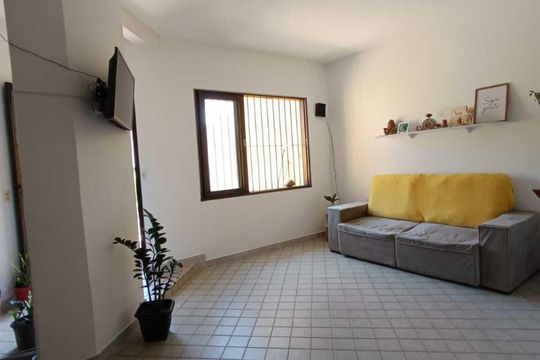 Sala de casa de condomínio para alugar com 3 quartos, 360m² em Itapuã, Salvador