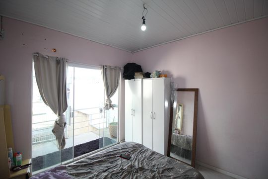 Quarto 1 de casa para alugar com 2 quartos, 126m² em Mário Quintana, Porto Alegre