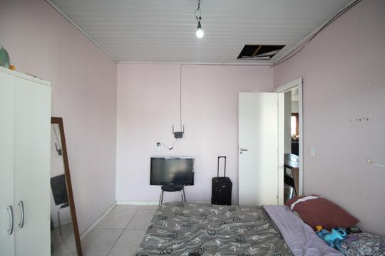Quarto 1 de casa para alugar com 2 quartos, 126m² em Mário Quintana, Porto Alegre
