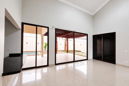 Sala de casa de condomínio para alugar com 5 quartos, 400m² em Alphaville Araguaia, Goiânia