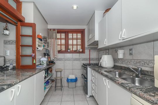 Cozinha de casa de condomínio à venda com 3 quartos, 234m² em Boa Vista, Porto Alegre