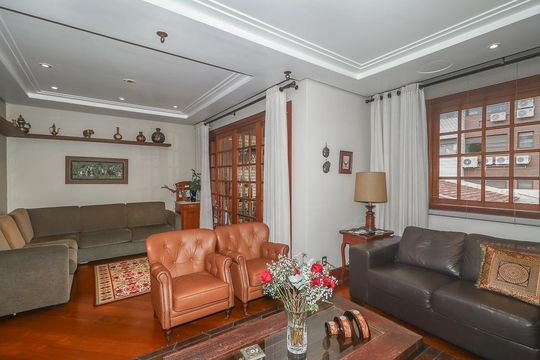 Sala de casa de condomínio à venda com 3 quartos, 234m² em Boa Vista, Porto Alegre