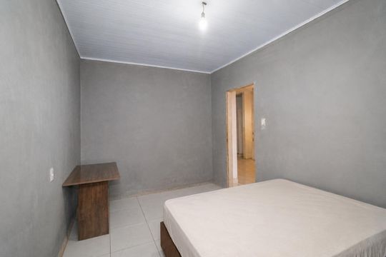 Quarto 2 de casa à venda com 3 quartos, 420m² em Harmonia, Canoas