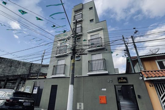 Fachada+Placa  de apartamento à venda com 2 quartos, 46m² em Parque Cruzeiro do Sul, São Paulo