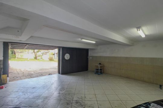 Garagem de casa à venda com 5 quartos, 409m² em Ipanema, Porto Alegre